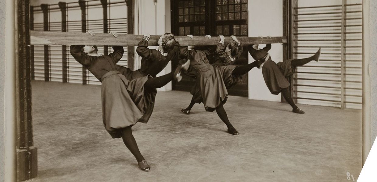 Women exercising on a balance beam
