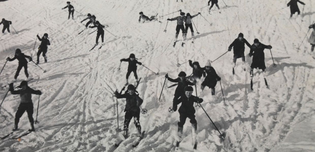 People skiing down a hill