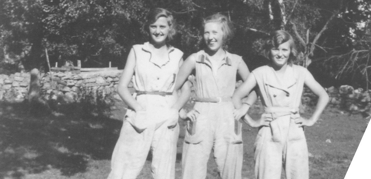 Three smiling women posing for a photo