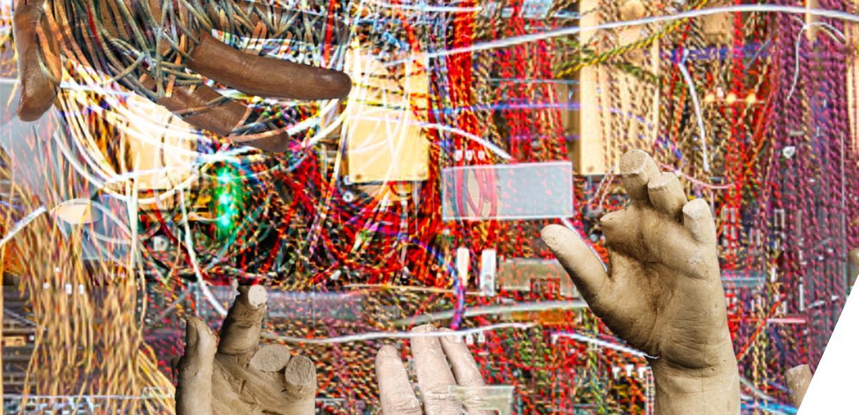 The image depicts a series of stone-like hands, fractured and cracked, reaching out in various directions from a chaotic mass of tangled wires. Some hands display broken fingers, while archival tags on others suggest anonymity and erasure. The juxtaposition of human forms and technological wires evokes themes of labor, exploitation, and the often unseen physical work behind the tech industry.
